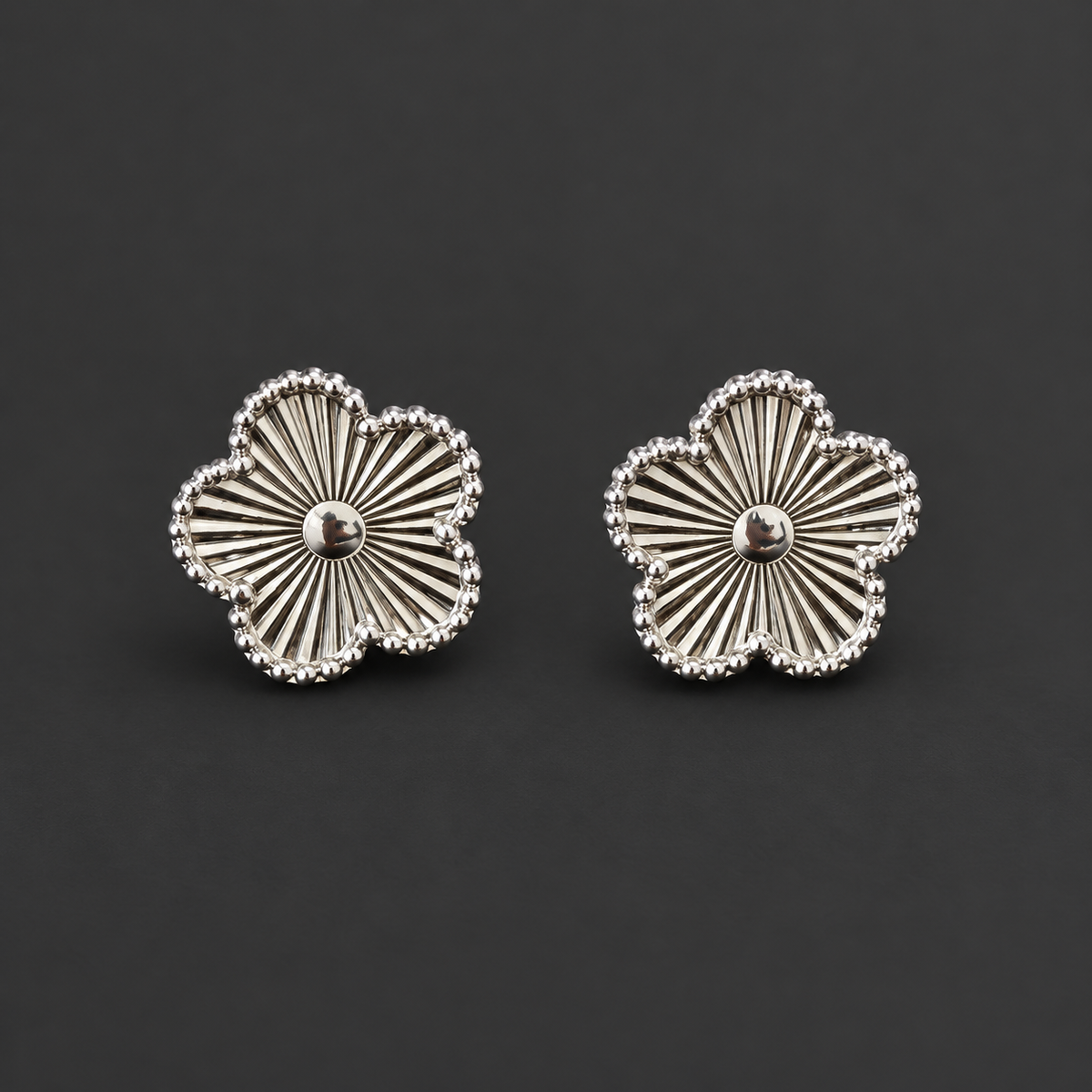Boucles d'oreilles fleurs argentées